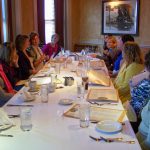 Image of PRI employees at a dinner table