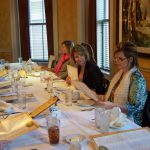 Image of PRI employees at a dinner table
